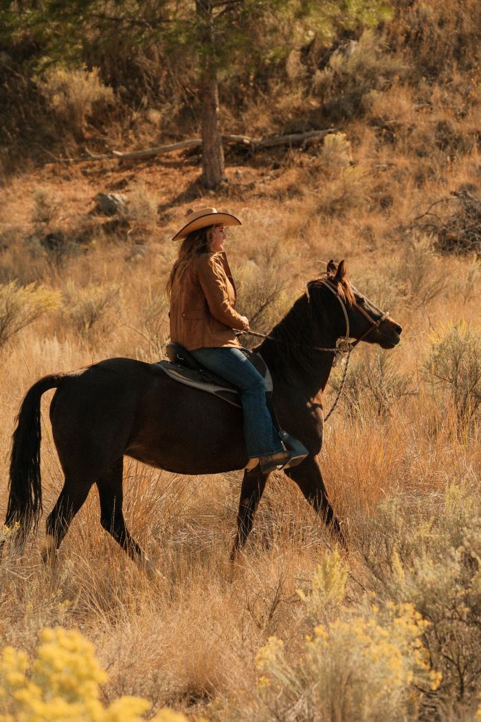 Woman riding in an Australia Saddle