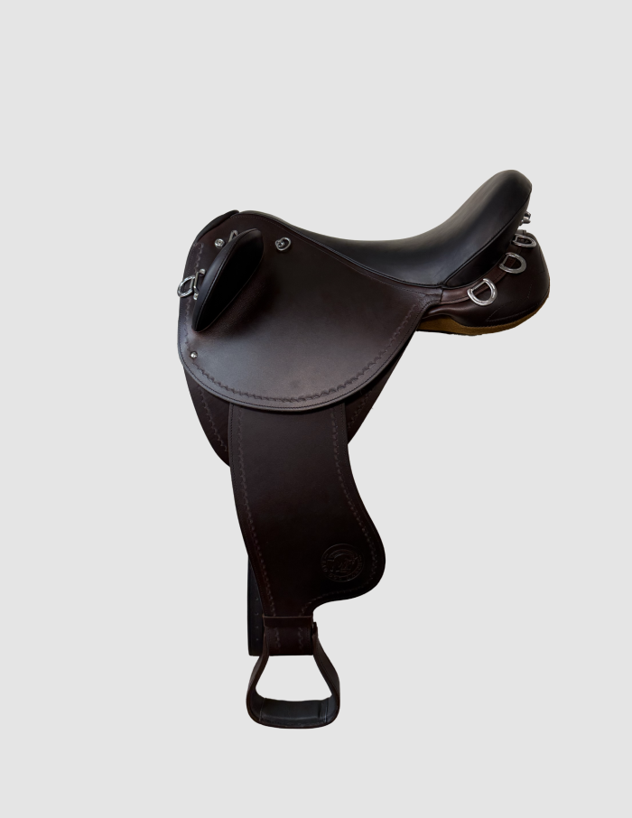 Brown Australian stock saddle with western fenders